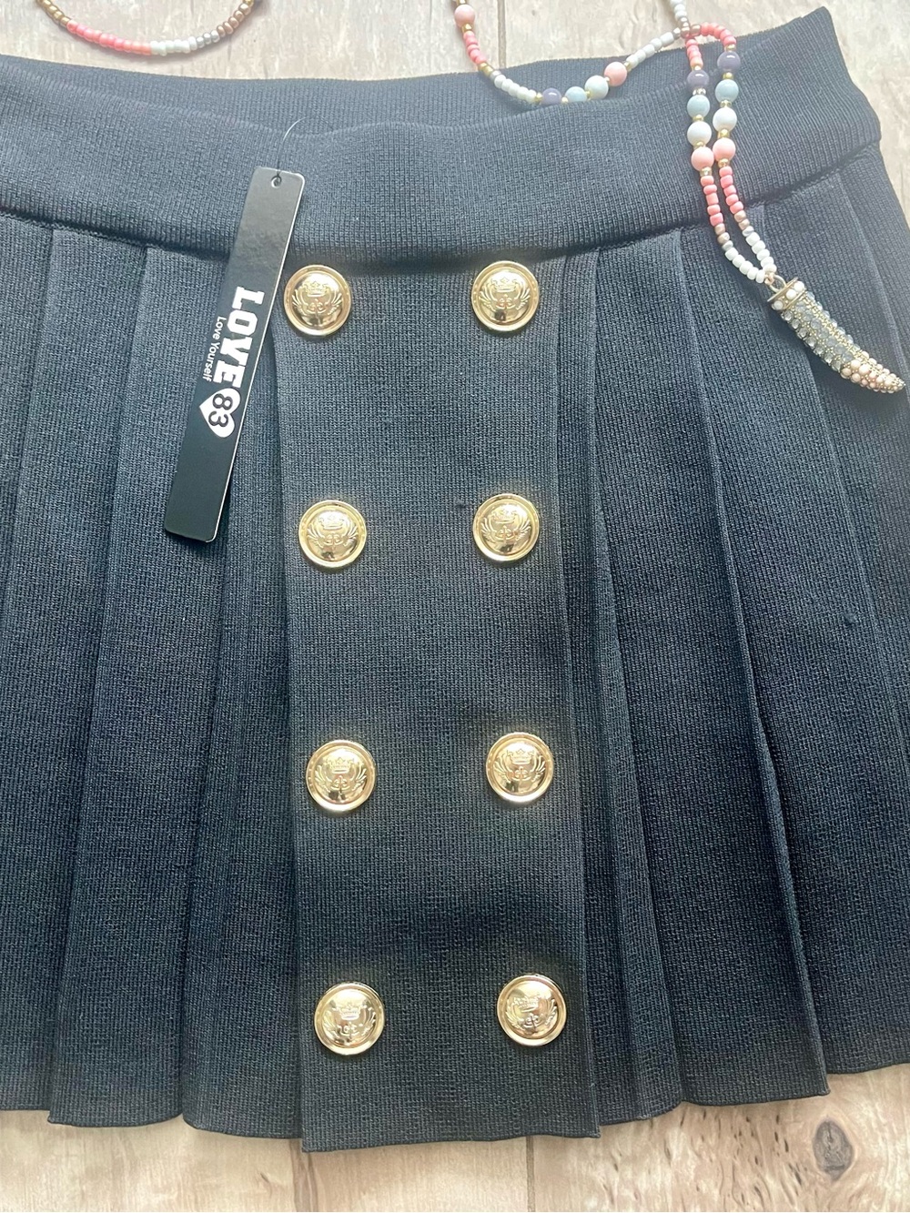 Love Black Pleated Mini Skirt with Gold Accent Buttons